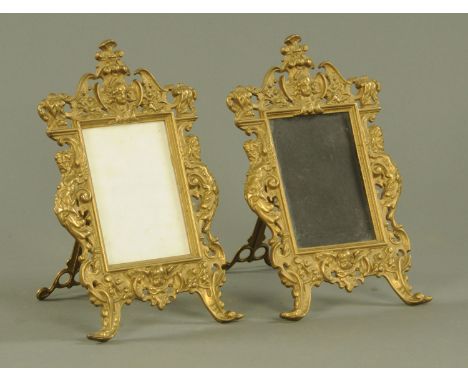 A pair of cast brass photograph frames, late 19th/early 20th century, cast in the Renaissance style with easel support to tak