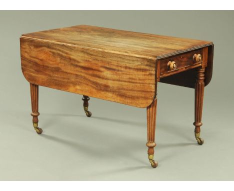 A Regency mahogany Gillows style Pembroke table, with moulded edge and rounded corners to each flap, fitted with an end drawe