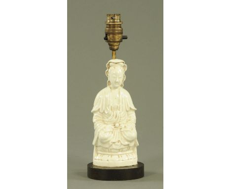 A Chinese Blanc de Chine figure, with table lamp mount.  Height including light fitting 28.5 cm. 