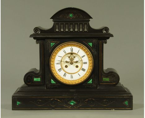 A large Victorian black slate mantle clock, of architectural form, with inset malachite panels, the enamelled dial with broco