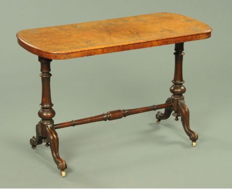 A Victorian inlaid walnut stretcher table, with turned end supports and downswept legs terminating in ceramic castors.  Width