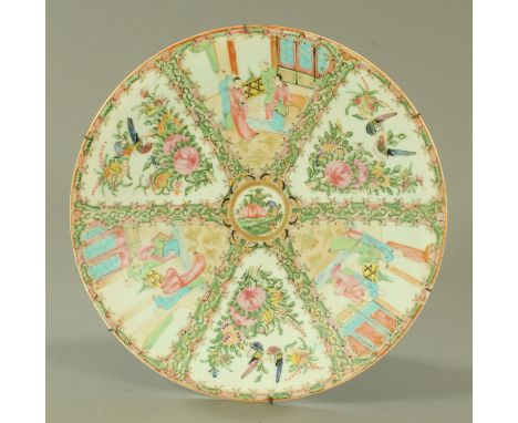 A late 19th century Cantonese charger, decorated with panels of figures, birds and flowers.  Diameter 38 cm. CONDITION REPORT