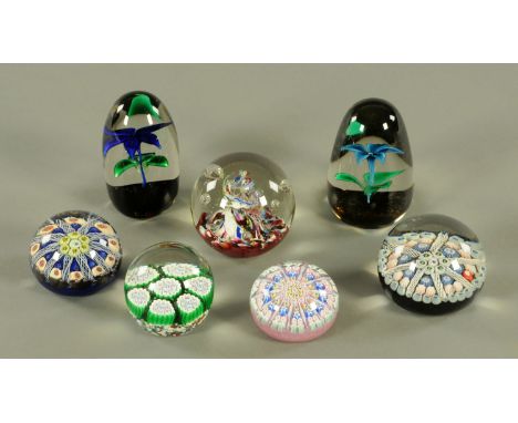 Seven assorted 20th century glass paperweights, to include 2 Strathearn with date canes "S75" and "S79", a further Strathearn