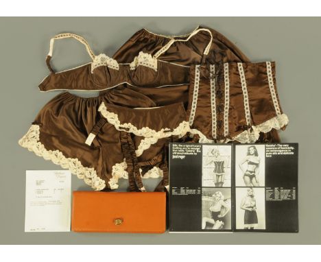 A ladies evening clutch bag by "Mawson Bag", the tan leather body with fitted interior with watered silk effect and with addi