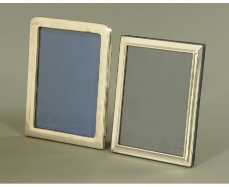 Two silver mounted photograph frames, William Harrison Walter, London 1899, with bevelled glass, overall 25.5 cm x 19.5 cm an