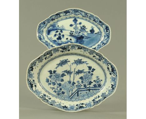 Two Chinese blue and white export lozenge shaped dishes, 18th century, the smaller example with a watery landscape and dwelli