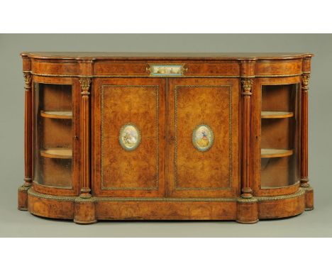 A Victorian walnut veneered credenza, the well figured top with applied gilt metal beading in turn above a well figured and c