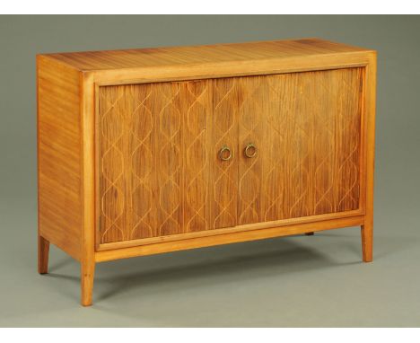 A Gordon Russell double helix teak sideboard, designed by David Booth and Judith Ledeboer for the 1951 Festival of Britain, t