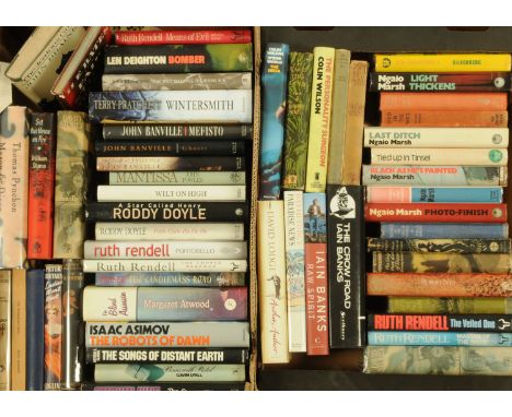 Two boxes of predominantly First Edition novels, to include the authors Terry Prachett, Isaac Asimov, Ruth Rendell, etc. (+/-