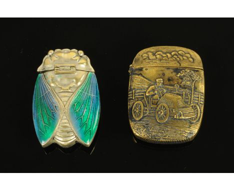 A brass Vesta case embossed with a vintage motorcar, and another in the form of a beetle.  