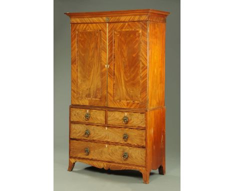 A Victorian Channel Islands press, with detachable moulded cornice above a pair of crossbanded doors opening to trays, the ba
