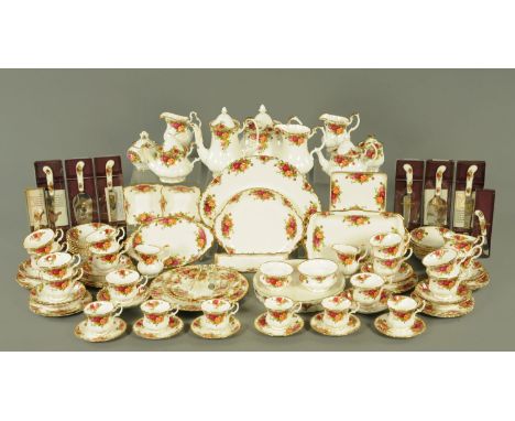 An extensive Royal Albert Old Country Roses tea service, comprising teapot, coffee pot, 14 tea cups and saucers, 6 coffee cup