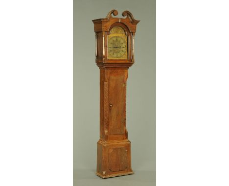 A George III longcase clock, the arched brass dial inscribed for Simpson, Wigton, the dial with Roman and Arabic numerals, wi