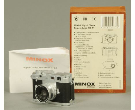 A Minox digital classic camera, Leica M3 2.1, with original box, lead and instructions.  CONDITION REPORT: A