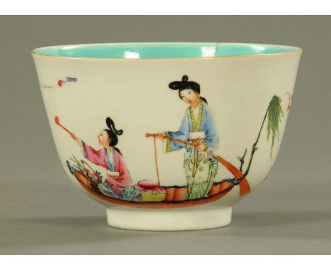 A Chinese porcelain deep bowl, in famille rose palette, depicting females in a boat, one female crouched proffering a Lingzhi