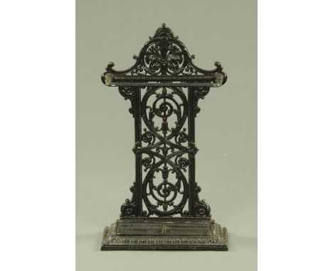 A Victorian cast iron "Falkirk" stick stand, the foliate cast decoration with bell flowers and beadwork borders, the reverse 