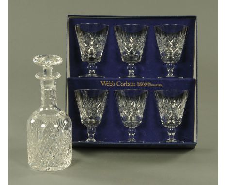 A set of six Webb Corbett lead crystal wine glasses, within presentation box, together with a cut glass decanter. CONDITION R