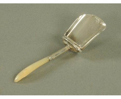 A George III silver caddy spoon, Birmingham 1904, with mother of pearl handle.  Length 95 mm. 