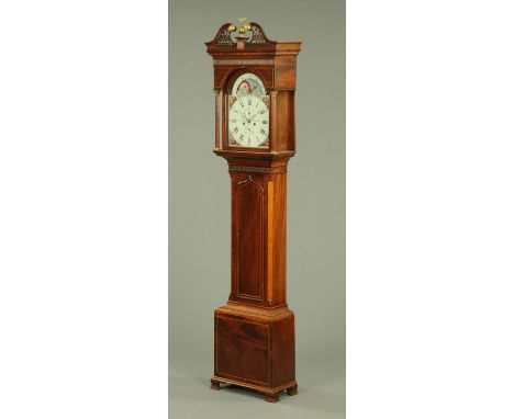 A George III mahogany longcase clock circa 1800 by Joseph Craig of Maryport, the swans neck pediment above a pierced fretwork