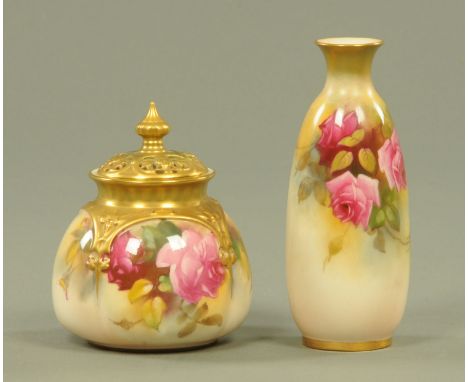 A Royal Worcester pot pourri vase, decorated with roses, and a similarly decorated vase, both with puce marks.  Tallest 15 cm