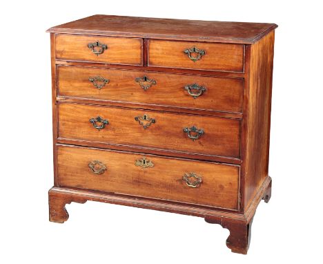 A GEORGE III MAHOGANY CHEST OF DRAWERS the rectangular top with a moulded edge over two short and three long graduated drawer