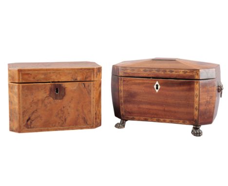A SARCOPHAGUS SHAPED INLAID TEA CADDY the hinged lid opening to reveal an interior of two compartments, the front with inlaid