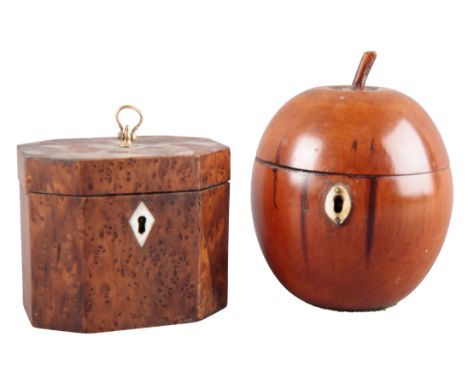 A FRUITWOOD APPLE-SHAPED TEA CADDY the hinged lid opening to a vacant interior, with an ivory escutcheon, 13cm high x 9cm dia