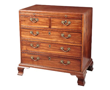 A GEORGE III MAHOGANY BACHELOR'S CHESTthe caddy top over a brushing slide, fitted with two short and three long graduated dra