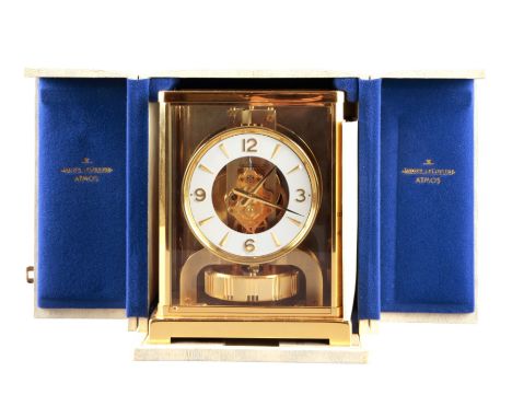 A JAEGER-LECOULTRE 'ATMOS CLASSIC V' CLOCKthe white enamel chapter ring with Roman numerals within a chamfered brass and glaz