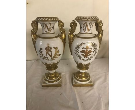 A pair of ceramic Napoleon urns (one A/F)