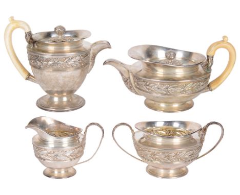 A Four-Piece late Victorian/Edwardian Silver and Ivory Handled Tea/Coffee Service:Of "cape" pattern, embossed with a band of 