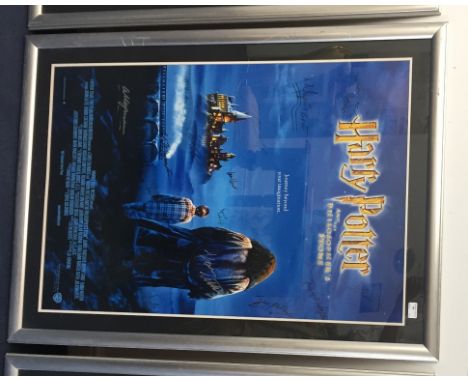 A Harry Potter and The Philosopher's Stone film poster, signed by cast members (Certificate of Authenticity verso), approx. 9