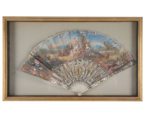 A Framed Hand Painted and Stick Ivory Fan:Late 18th/early 19th century, the hand painted section painted in the manner of Wat