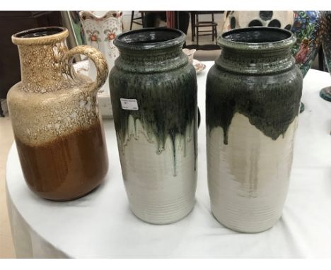 Three German ceramic vases; together with a vase by Chris Wallis