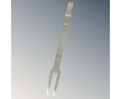 A cast solid sliver copy of a 17th century fork dated 1632, London 1935 CONDITION REPORT: 60g