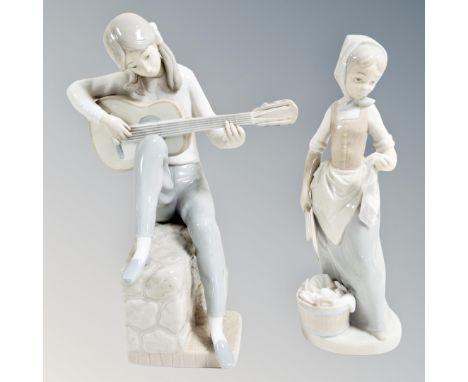 A Nao figure of a Girl with guitar together with a further Nao wash girl figure 