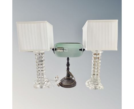 A contemporary banker's lamp with green glass shade together with a further pair of table lamps with shades 