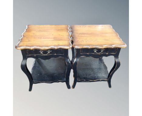 A pair of French style two tone lamp tables fitted drawer and undershelf 