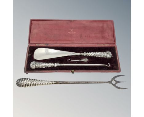 A Victorian cased silver mounted shoehorn and button hooks, together with a silver mounted toasting fork 