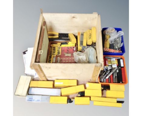 A wooden crate with lid containing Sandik lathe turning tools in cases, cased precision instruments etc 