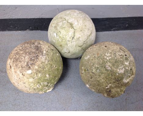 A pair of concrete pillar cap balls together with a further composite ball 