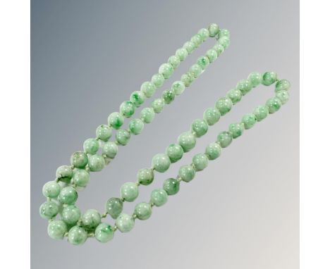 A long jade bead necklace, length 60cm. 