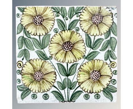 William De Morgan - A Bedford Park Anemone tile, painted with five flowers in shades of yellow and green on a white ground, i