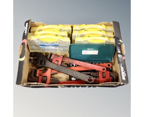 A box of six cased Silverine nut packs, cased socket sets, together with three over-sized wrenches and adjustable spanner 