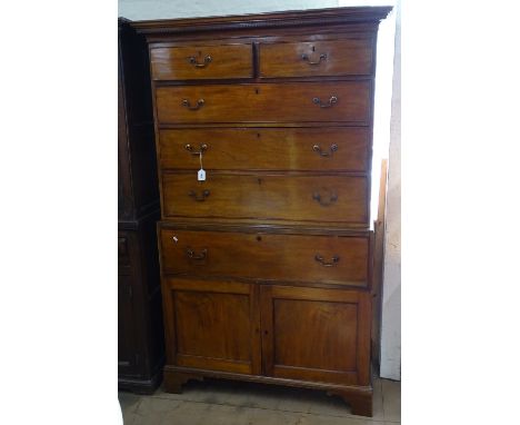 A 19th century mahogany 2-section chest on secretaire base, with panelled cupboards under, on bracket feet, W112cm, H200cm 