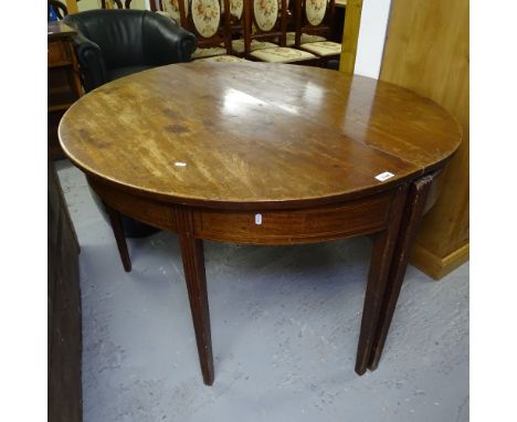 A pair of 19th century mahogany demilune console tables 
