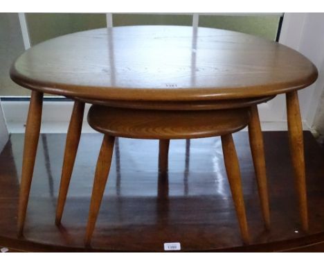A nest of 3 Ercol elm pebble occasional tables 
