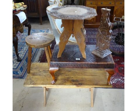 An elm milking stool, a Persian octagonal card occasional table, a tooled leather-top stool, and an oak occasional table on X