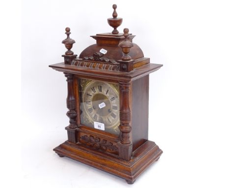 A 19th century German mahogany-cased architectural 8-day mantel clock, silvered brass dial with Roman numeral hour markers an