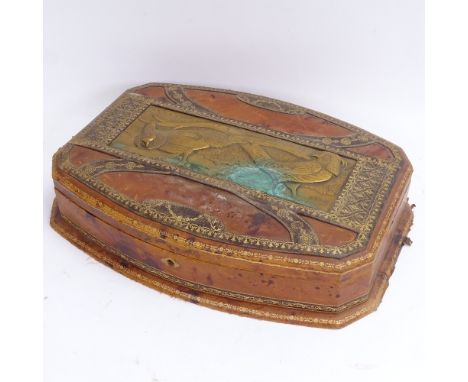 An Art Nouveau French leather-covered dressing table case, the lid having inset gilded spelter pheasant design panel, signed 